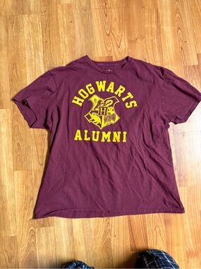 Warner Bros. Maroon Tee with Yellow Hogwarts Crest
